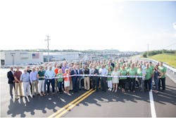 A. O. Smith leadership and employees, along with state and local government officials gather Aug. 25 for a ribbon cutting to celebrate the completion of a 7,000-foot earthen berm, designed to protect our manufacturing plant in Ashland City, the city&apos;s water treatment facility and the CEMC substation from future flooding disasters.