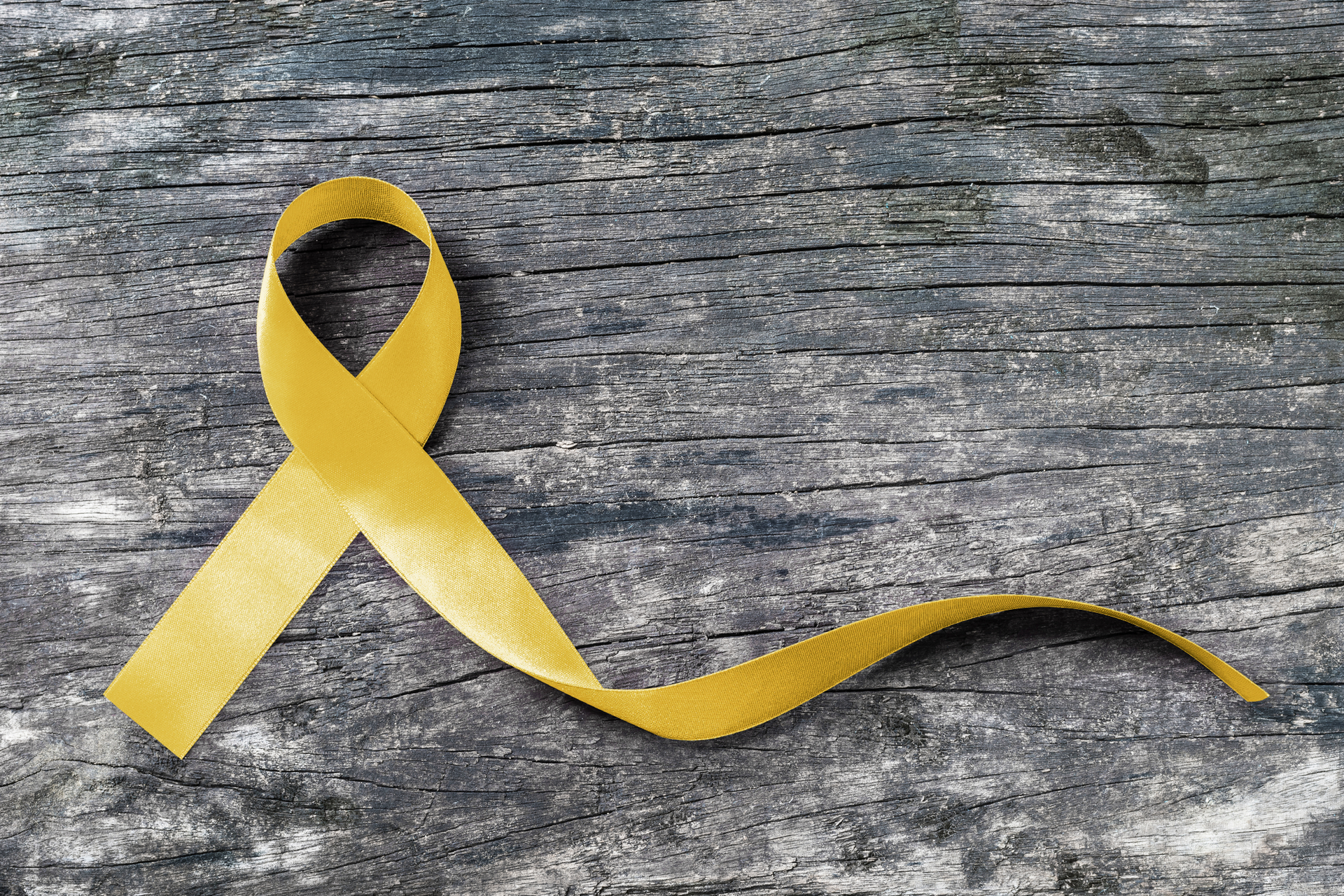 The yellow ribbon is a symbol for suicide prevention month.