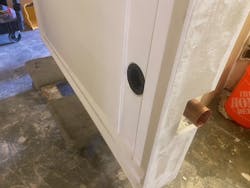 Top view of shower pan showing drain cover installed- Cover palte is polished chrome but still has plastic protection sheet on it. Top view of shower pan showing drain cover installed- Cover palte is polished chrome but still has plastic protection sheet on it.