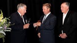 Ron Warren passes the ceremonial gavel to Matt Thiel, who will serve as the VMA's new Chairman of the Board for the 2022-2023 term. Ron Warren passes the ceremonial gavel to Matt Thiel, who will serve as the VMA's new Chairman of the Board for the 2022-2023 term.