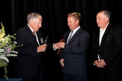 Ron Warren passes the ceremonial gavel to Matt Thiel, who will serve as the VMA's new Chairman of the Board for the 2022-2023 term. Ron Warren passes the ceremonial gavel to Matt Thiel, who will serve as the VMA's new Chairman of the Board for the 2022-2023 term.