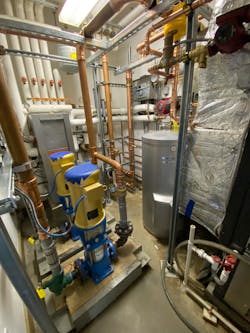 The carriage house mechanical room with the new loop pumps in place. The carriage house mechanical room with the new loop pumps in place.