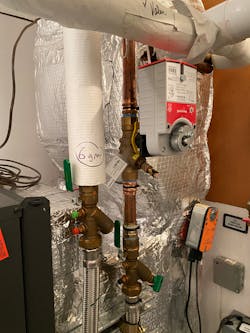 The motorized PICV ball valve in the main house mechanical room. The motorized PICV ball valve in the main house mechanical room.