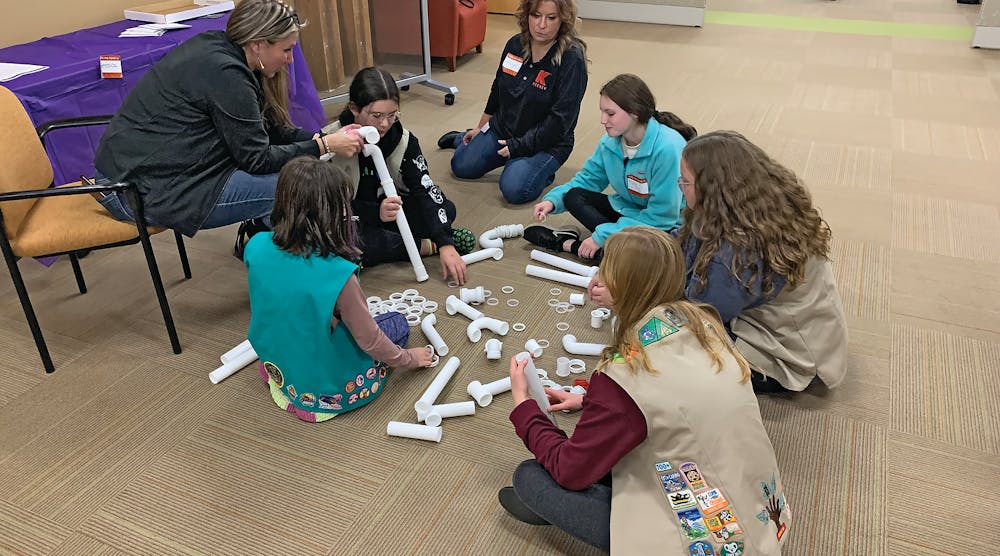 A hands-on plastic tubular engineering challenge, in which Girl Scouts applied problem solving skills to determine the most efficient way to move an object.