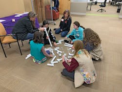 A hands-on plastic tubular engineering challenge, in which Girl Scouts applied problem solving skills to determine the most efficient way to move an object. A hands-on plastic tubular engineering challenge, in which Girl Scouts applied problem solving skills to determine the most efficient way to move an object.