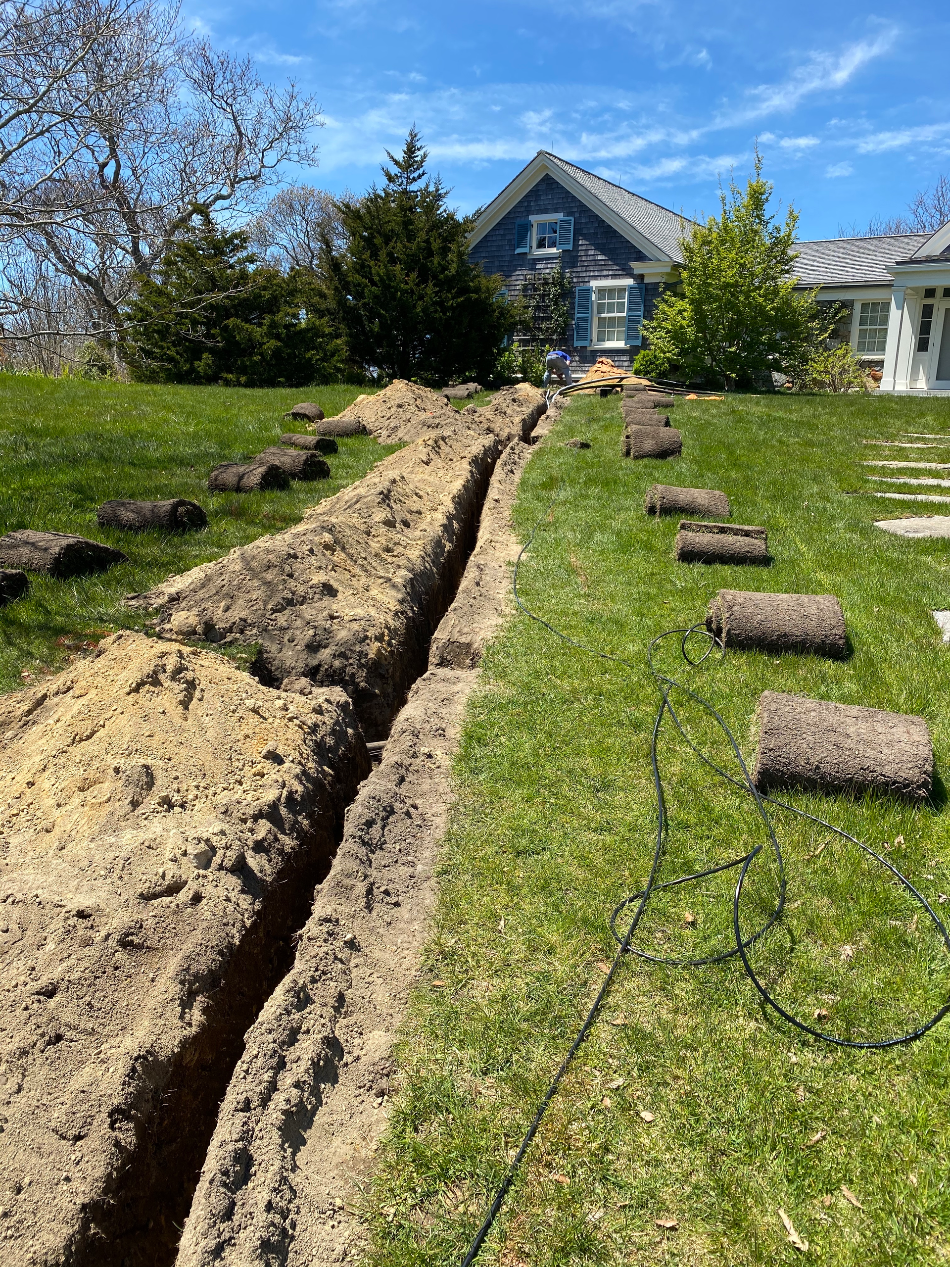 The supply return piping running from the carriage house to the main house.