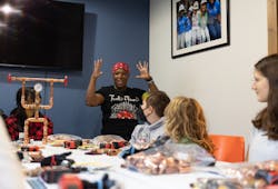 Judaline Cassidy provides inspiration during the event. A 'Mighty Minka' figure is on the left side of the picture. Judaline Cassidy provides inspiration during the event. A 'Mighty Minka' figure is on the left side of the picture.