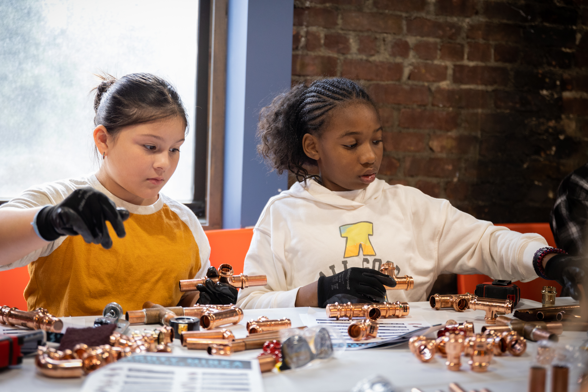Two young attendees at the Tools & Tiaras event.