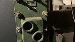 Photo 1. -- a mid-20th century tankless water heater. Photo 1. -- a mid-20th century tankless water heater.