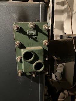 Photo 1. -- a mid-20th century tankless water heater. Photo 1. -- a mid-20th century tankless water heater.