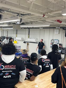 Brent Ridley talks with students at the kick-off for the Atlanta College and Career Academy project. Brent Ridley talks with students at the kick-off for the Atlanta College and Career Academy project.
