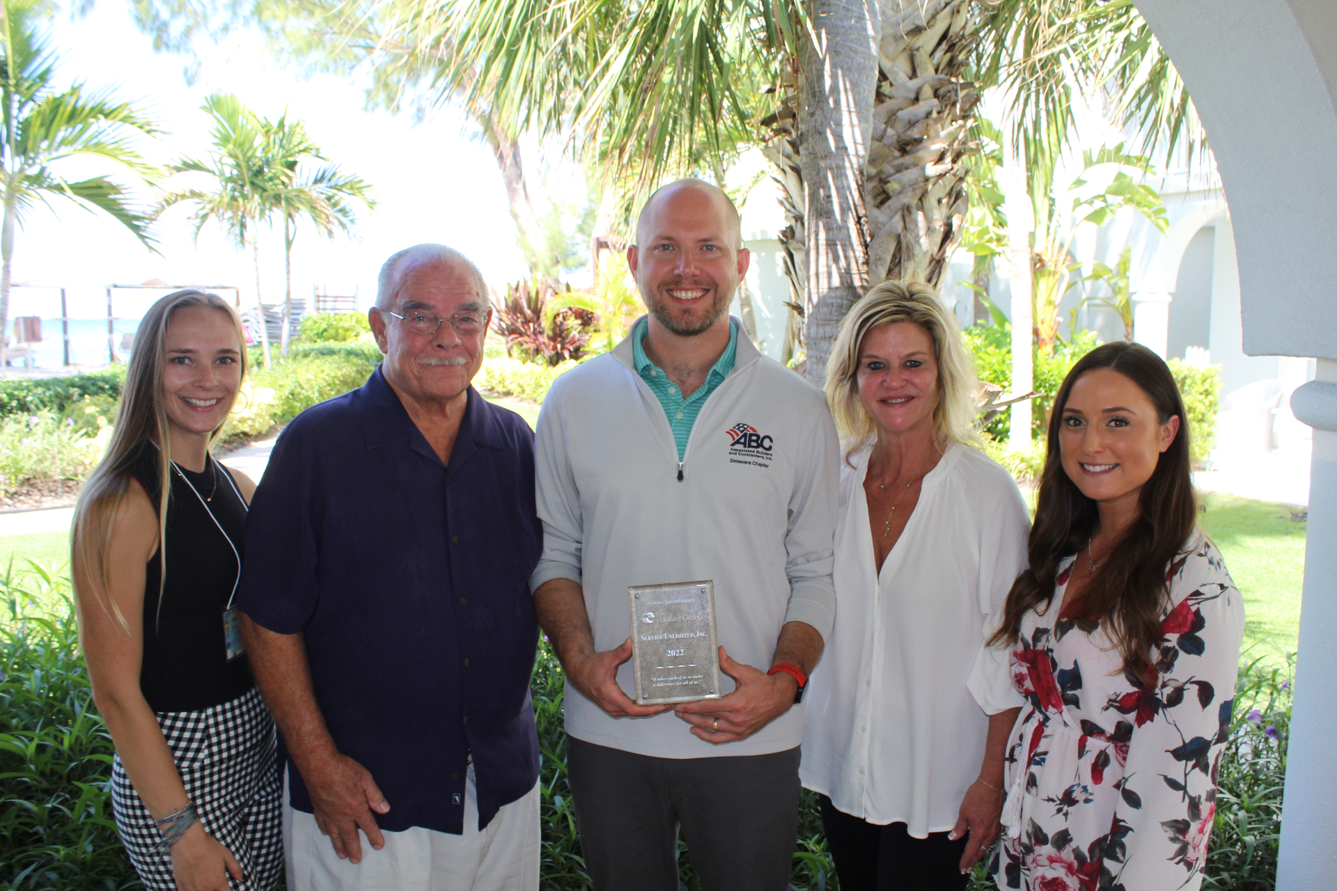 The Service Unlimited, Inc. team with their Making the Difference Award.