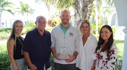 The Service Unlimited, Inc. team with their Making the Difference Award. The Service Unlimited, Inc. team with their Making the Difference Award.