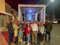 Jimmy Hiller and the Hiller family with a truckful of toys to donate after shopping spree. Jimmy Hiller and the Hiller family with a truckful of toys to donate after shopping spree.