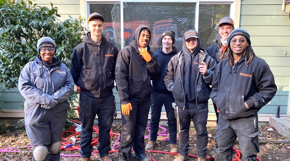The seven-member crew from Harts Services&apos; innovative in-house apprenticeship program.
