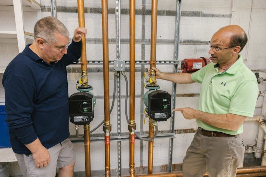 Two Taco 00e ECM pumps serve the space heating needs of a different wing of the school. Two Taco 00e ECM pumps serve the space heating needs of a different wing of the school.