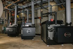 Three HTP Enduro Ti 750 MBH boilers in the mechanical room at Greenwich Catholic School. Three HTP Enduro Ti 750 MBH boilers in the mechanical room at Greenwich Catholic School.
