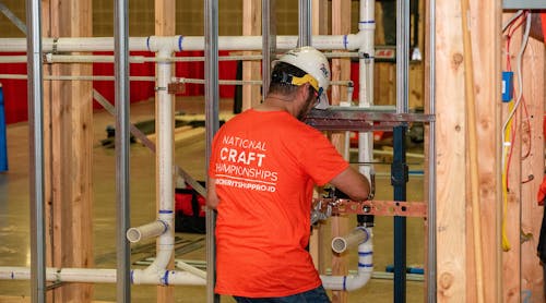 A contestant in the plumbing portion of the 2022 National Construction Craft Championships.