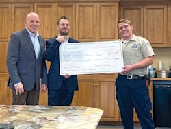 John Glass and Rob Weed of Saniflo SFA attended to congratulate Thomas on the award. John Glass and Rob Weed of Saniflo SFA attended to congratulate Thomas on the award.