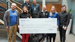 Recipients of the Uponor North America Unsung Heroes donations gathered in Apple Valley, Minn., to be honored with their donations. From L-R: Alex Khrystych, Sarah Qualy, David Nguyen, Yakov Gradinar, Nate Martineau, Aubrey Mozer, andYury Aroshidze.