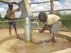 Children at the new well in Odyek Pe. Children at the new well in Odyek Pe.