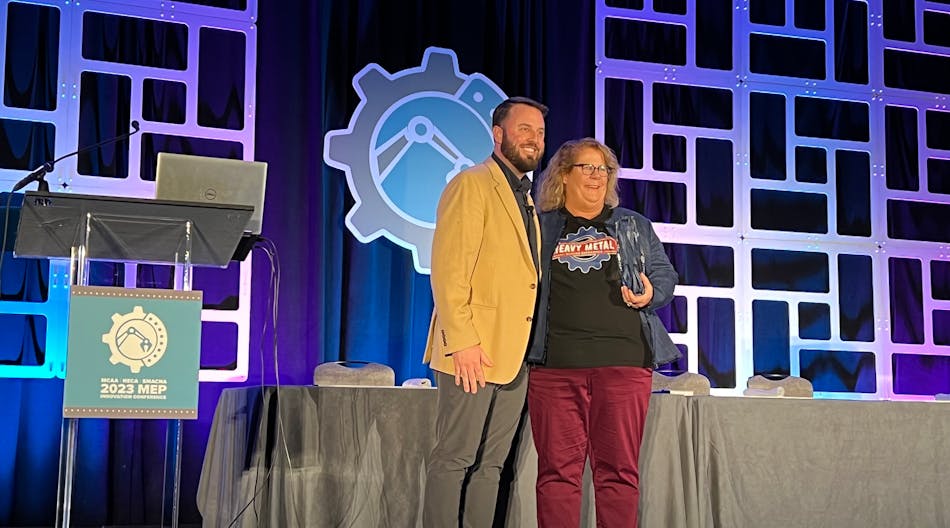 Angie Simon was presented with the inaugural &apos;Industry Advocate Award&apos; at the 2023 MEP Innovation Conference for her efforts with the Heavy Metal Summer Experience.