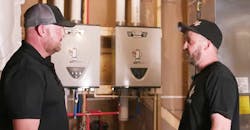 Jerry Winslet, A. O. Smith senior technical trainer (left) and Ronnie Sanders of Sanders Plumbing (right). Jerry Winslet, A. O. Smith senior technical trainer (left) and Ronnie Sanders of Sanders Plumbing (right).