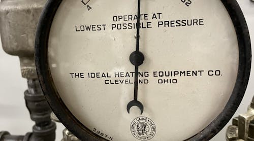 Pat Linhardt&apos;s favorite steam gauge from his personal collection. Ounces to the right of zero, inches of water column of vacuum to the left of zero.