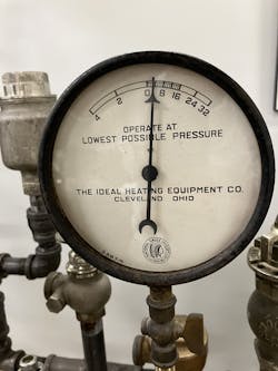 Pat Linhardt's favorite steam gauge from his personal collection. Ounces to the right of zero, inches of water column of vacuum to the left of zero. Pat Linhardt's favorite steam gauge from his personal collection. Ounces to the right of zero, inches of water column of vacuum to the left of zero.