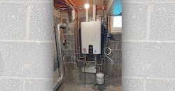 The finished tankless installation. The Sanicondens Best Flat unit can be seen underneath the Navien unit, just above the expansion tank. The finished tankless installation. The Sanicondens Best Flat unit can be seen underneath the Navien unit, just above the expansion tank.