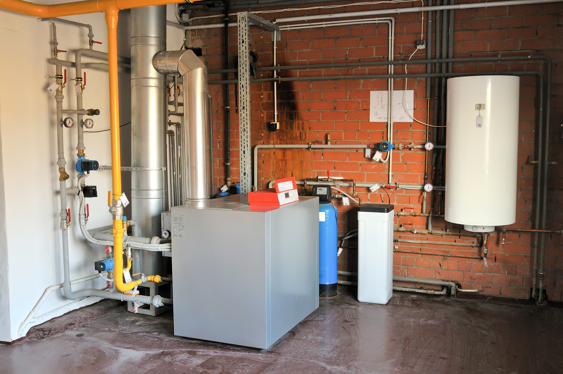 A residential gas boiler with storage tank.