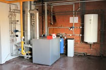 A residential gas boiler with storage tank.