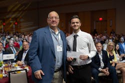 Brock Schulz accepts his scholarship award at the MCAA ceremony. Brock Schulz accepts his scholarship award at the MCAA ceremony.