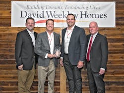Shown from left: John Schiegg, vice president, Supply Chain Services, David Weekley Homes; Robert Larson, director, Sales National Accounts, Uponor; Matt Bahr, VP, Sales, Uponor; and John Johnson, CEO, David Weekley Homes. Shown from left: John Schiegg, vice president, Supply Chain Services, David Weekley Homes; Robert Larson, director, Sales National Accounts, Uponor; Matt Bahr, VP, Sales, Uponor; and John Johnson, CEO, David Weekley Homes.