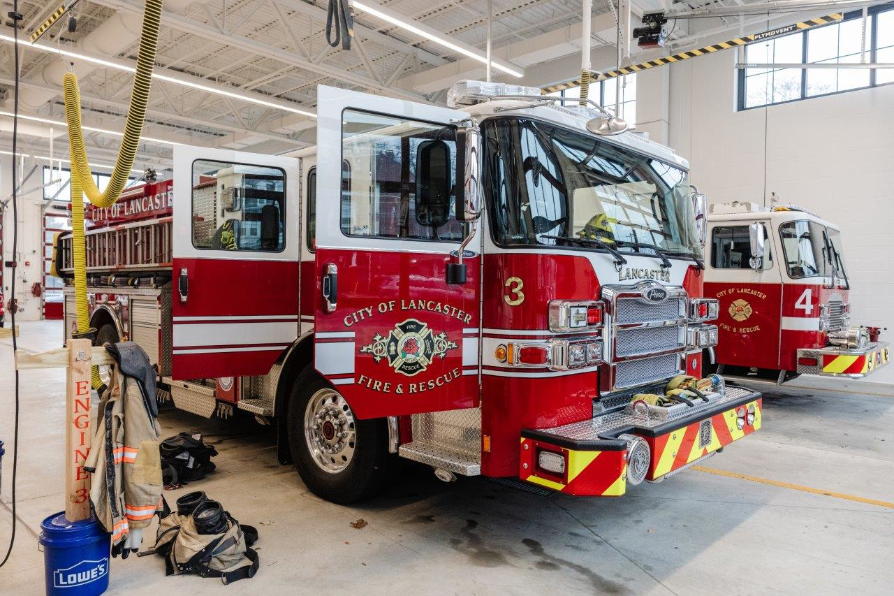 In the enclosed, radiantly-heated equipment bays, the spit-shined red and gold trucks are kept in mint condition. If garage doors are opened for a quick exit during the winter months, the radiant heat assures fast set-temp recovery.