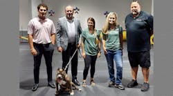 Piper poses with members of the J. W. Danforth team. Piper poses with members of the J. W. Danforth team.