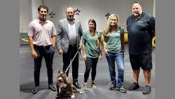 Piper poses with members of the J. W. Danforth team. Piper poses with members of the J. W. Danforth team.