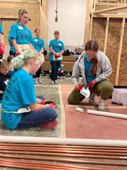 Campers were instructed in how to install the Quadtro Washing Machine Outlet Box and how to use other plumbing products.