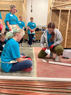 Campers were instructed in how to install the Quadtro Washing Machine Outlet Box and how to use other plumbing products. Campers were instructed in how to install the Quadtro Washing Machine Outlet Box and how to use other plumbing products.