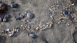 Microplastics on a beach. Microplastics on a beach.