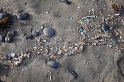 Microplastics on a beach. Microplastics on a beach.