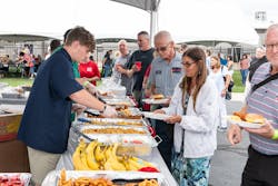 Festivities included a beer tent, carnival games, food, live music and even plant tours. Festivities included a beer tent, carnival games, food, live music and even plant tours.