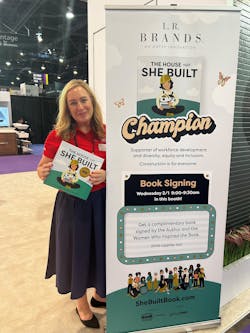 Katherine Lehtinen promoting The House That She Built at a tradeshow. Katherine Lehtinen promoting The House That She Built at a tradeshow.