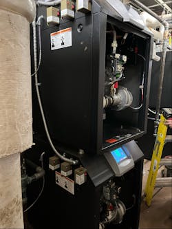 One of the Elite boilers with its service cover off. One of the Elite boilers with its service cover off.