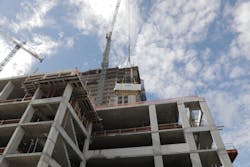 Spools were carefully crated in special protective containers, then hoisted by crane to whatever floor Colwill’s crews were working on. Spools were carefully crated in special protective containers, then hoisted by crane to whatever floor Colwill’s crews were working on.