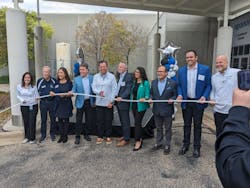 Uponor North America President Andres Caballero cuts the plastic pipe 'ribbon' to open the company's new Experience Center. Uponor North America President Andres Caballero cuts the plastic pipe 'ribbon' to open the company's new Experience Center.