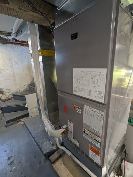 A Fujitsu air handler was installed to retrofit the heat pump to the home&rsquo;s existing ductwork.
