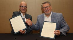 Roman Feher and Dave Viola at the signing ceremony. Roman Feher and Dave Viola at the signing ceremony.