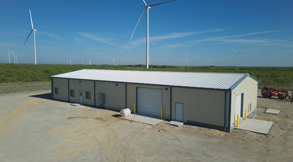 A few wind turbines and the operations center at Century Oak.