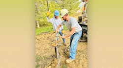 Volunteers working on the new system. Volunteers working on the new system.